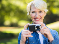middle aged woman with her camera