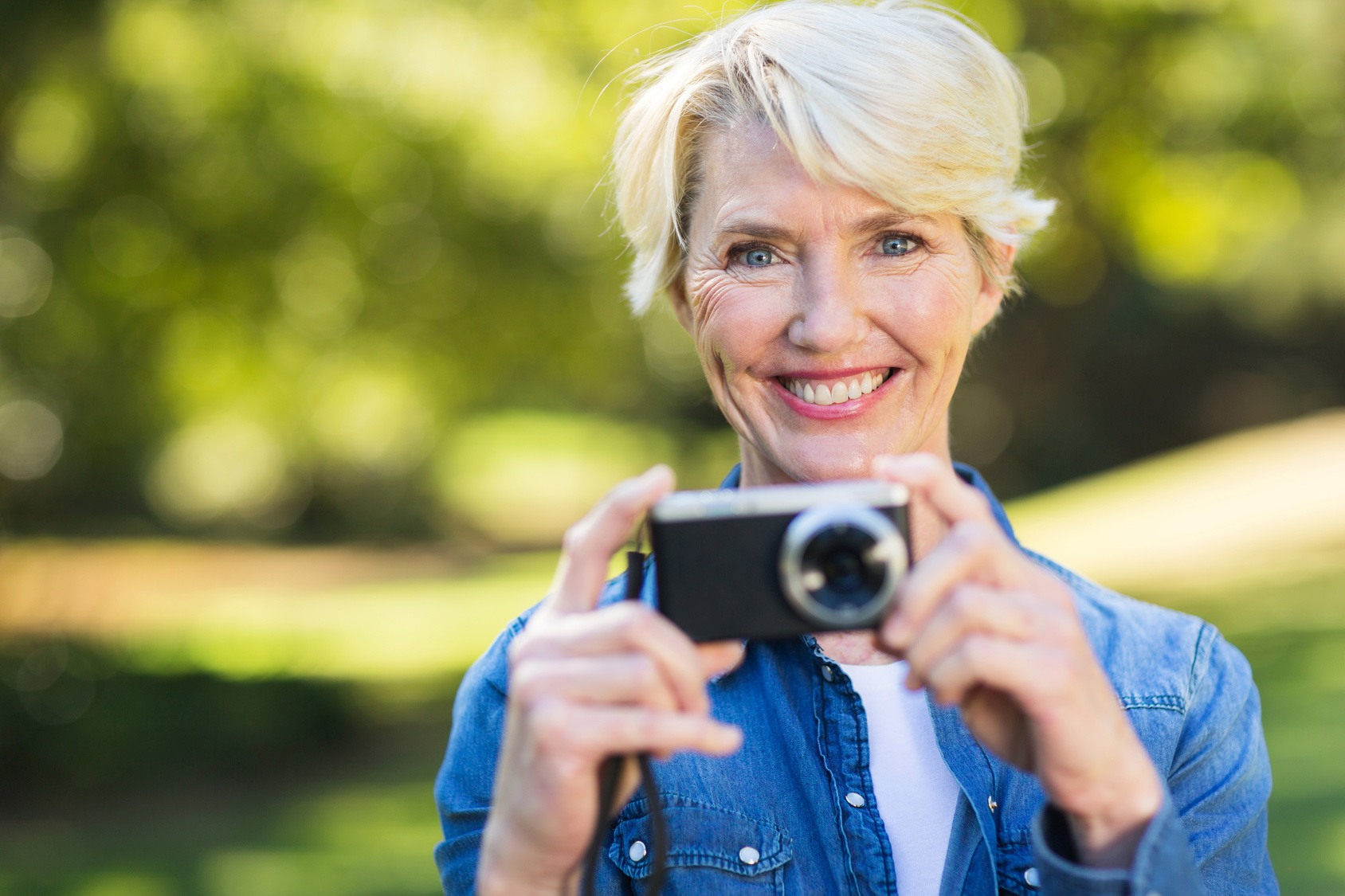 middle aged woman with her camera