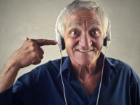 Happy man listening to music